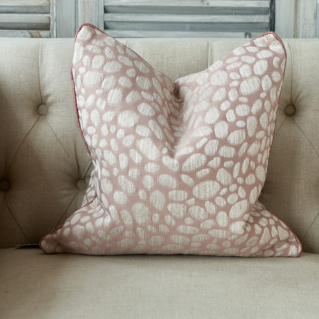 Pebble textured cushion in blush pink with tonal piping