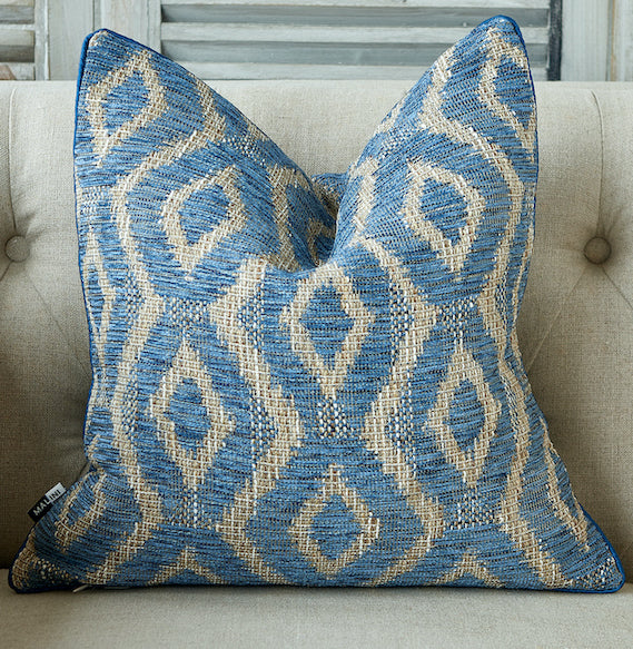 Blue geometric pattern textured cushion