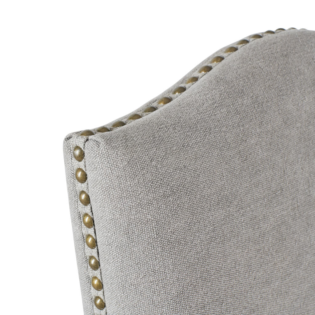 Portman dining chair in dove grey top of seat brass stud trim and scalloped top detail